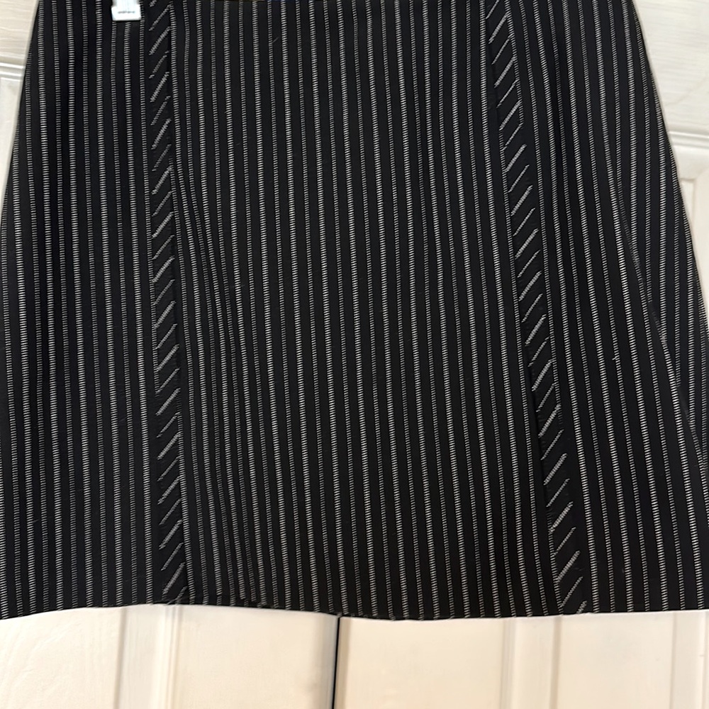 Bebe pinstriped mini skirt. Size 4